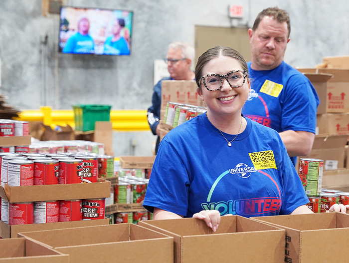 Volunteer from Universal in warehouse
