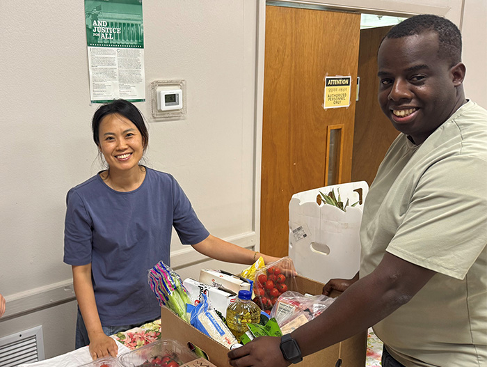 Volunteer sorting donations